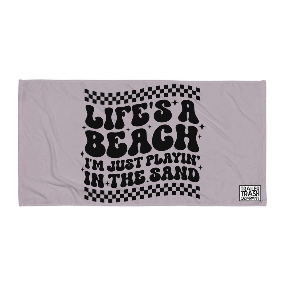 Life's a beach I'm just playing in the sand